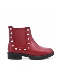 Red girl's boot in faux leather with elastic panel