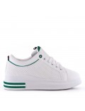 Zapatilla deportiva con cordones de piel sintética para mujer