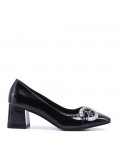 Leatherette pump with heels