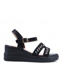 Women's faux leather wedge sandal