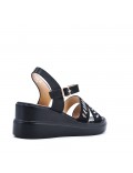 Women's faux leather wedge sandal