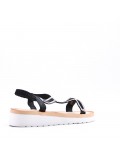 Women's faux leather wedge sandal