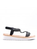 Women's faux leather wedge sandal