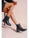 Ankle boot in a mix of materials for autumn and winter