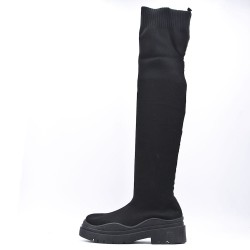 Bota en una mezcla de materiales para otoño e invierno.