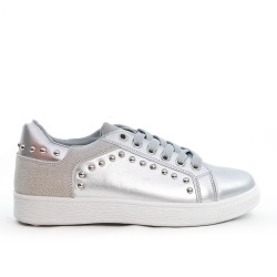 Silver sneaker with lace adorned with nails