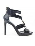 Black sandal in varnish