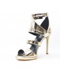 Golden sandal in metallic varnish