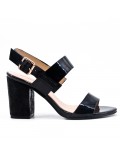 Black sandal in varnish